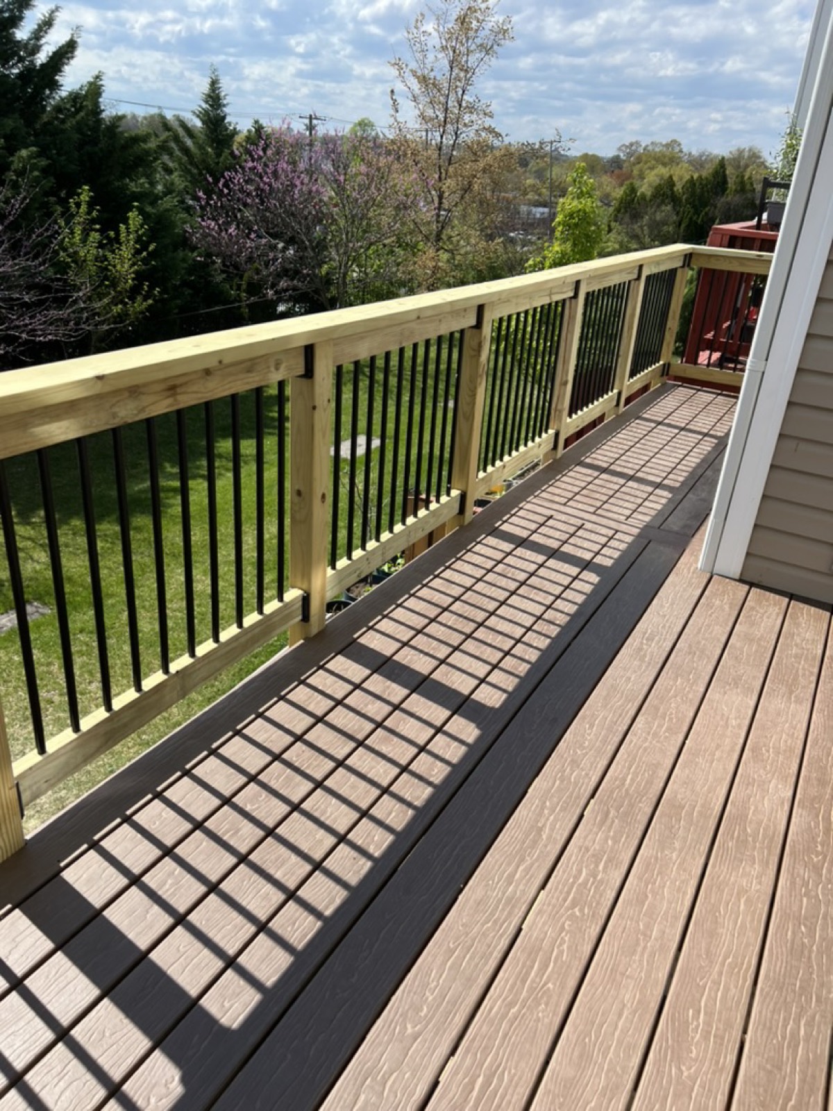 Aluminum railing composite deck detail