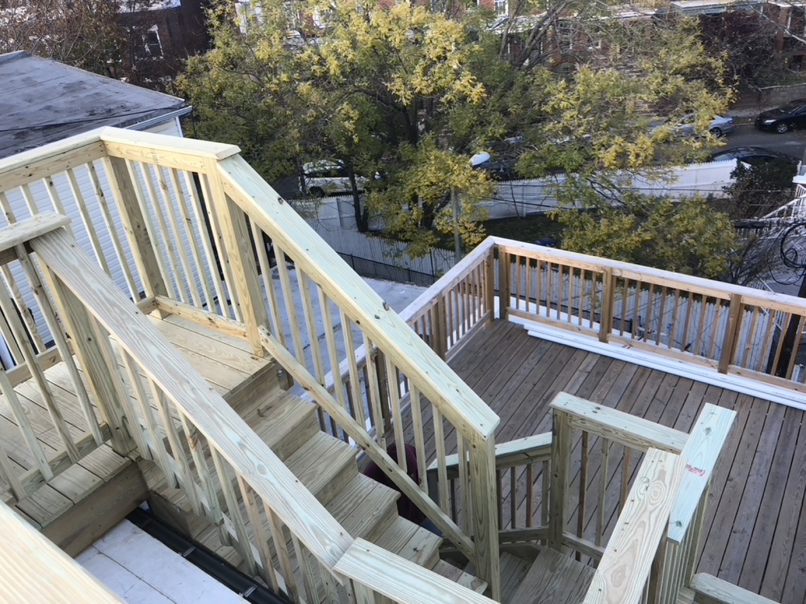 Composite deck wood rail black balusters