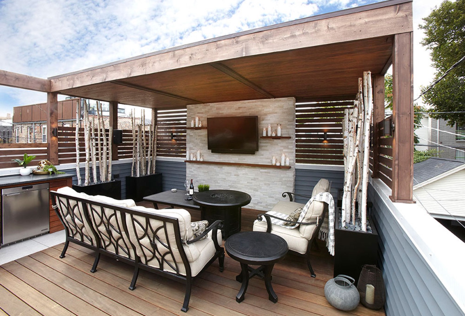 Covered outdoor kitchen lounge TV