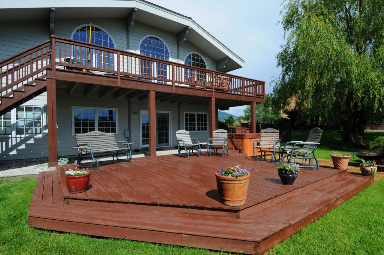Finished reddish wood deck resurfacing example