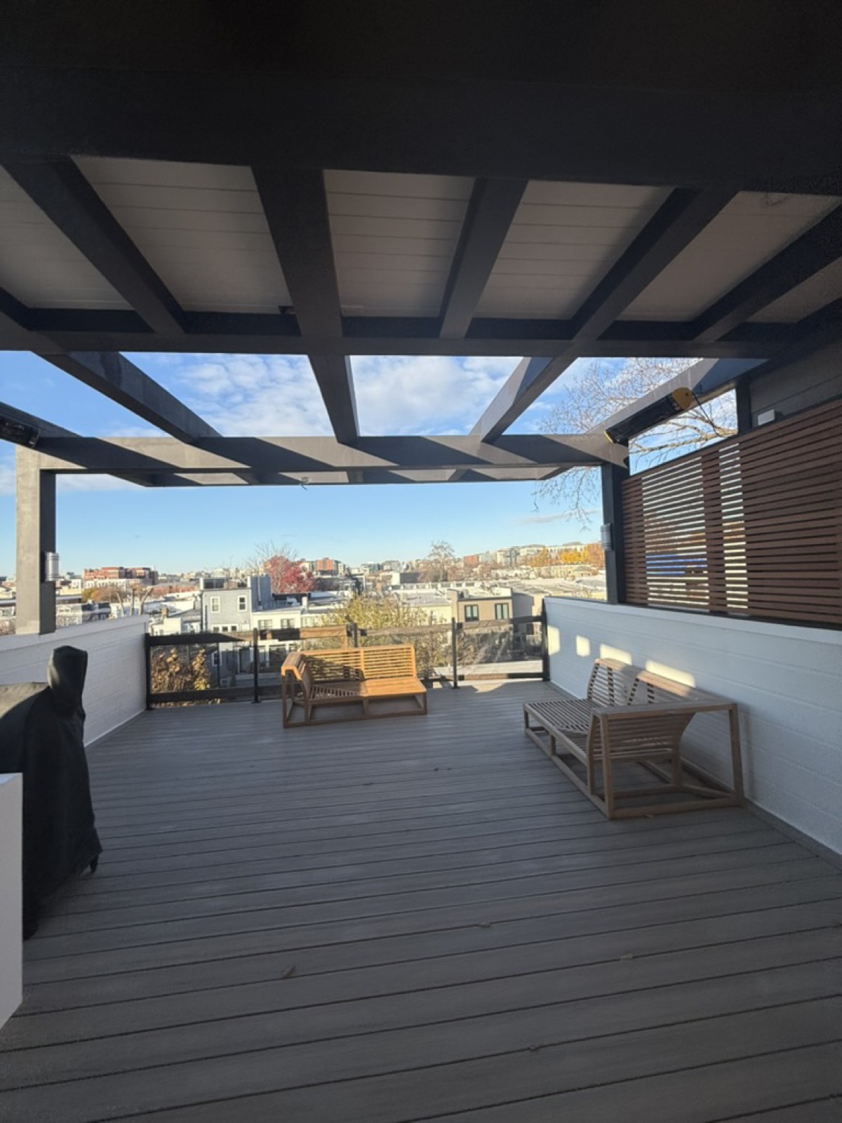 Rooftop terrace slat pergola seating