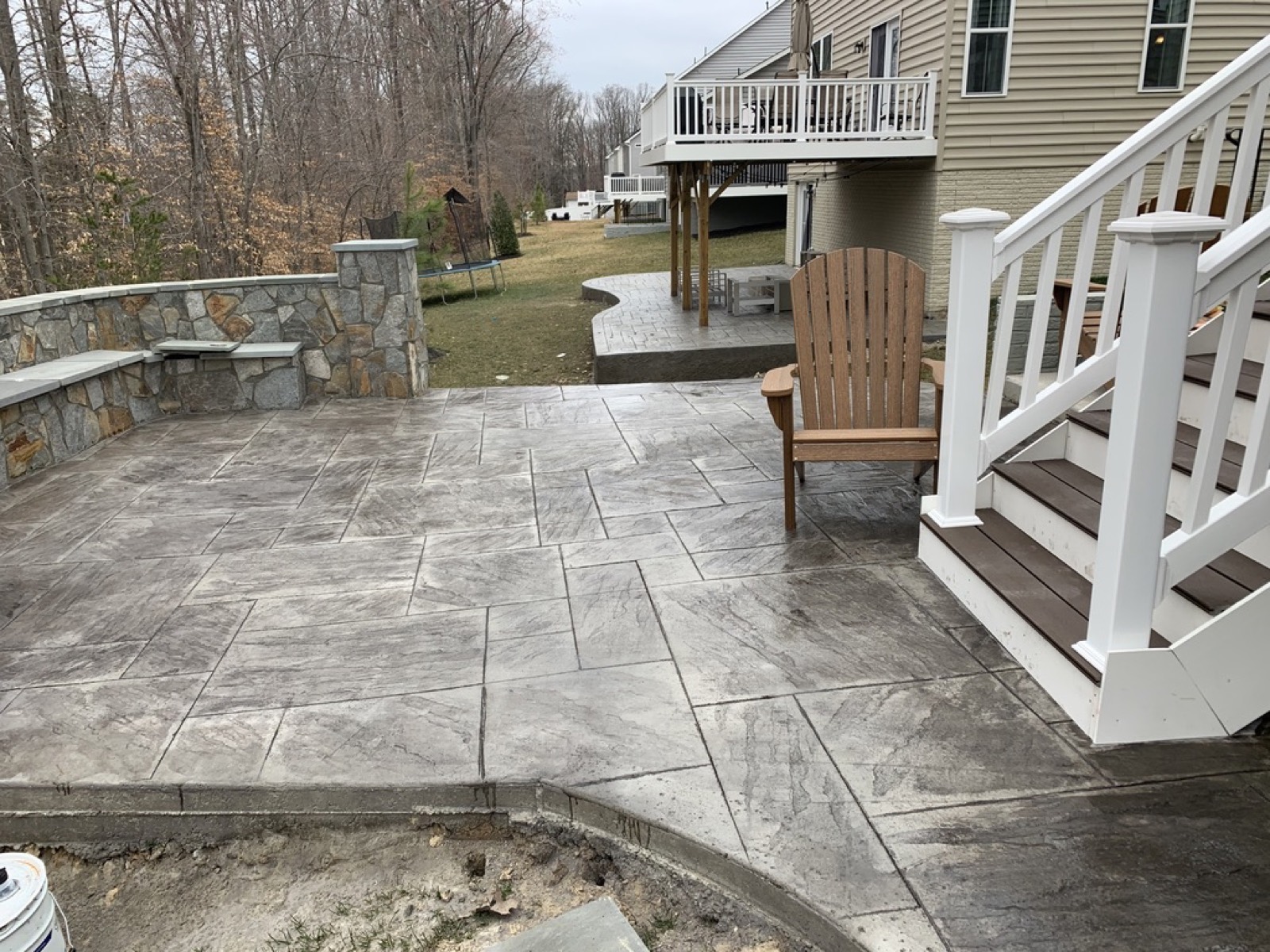 Stamped concrete patio stone seat wall