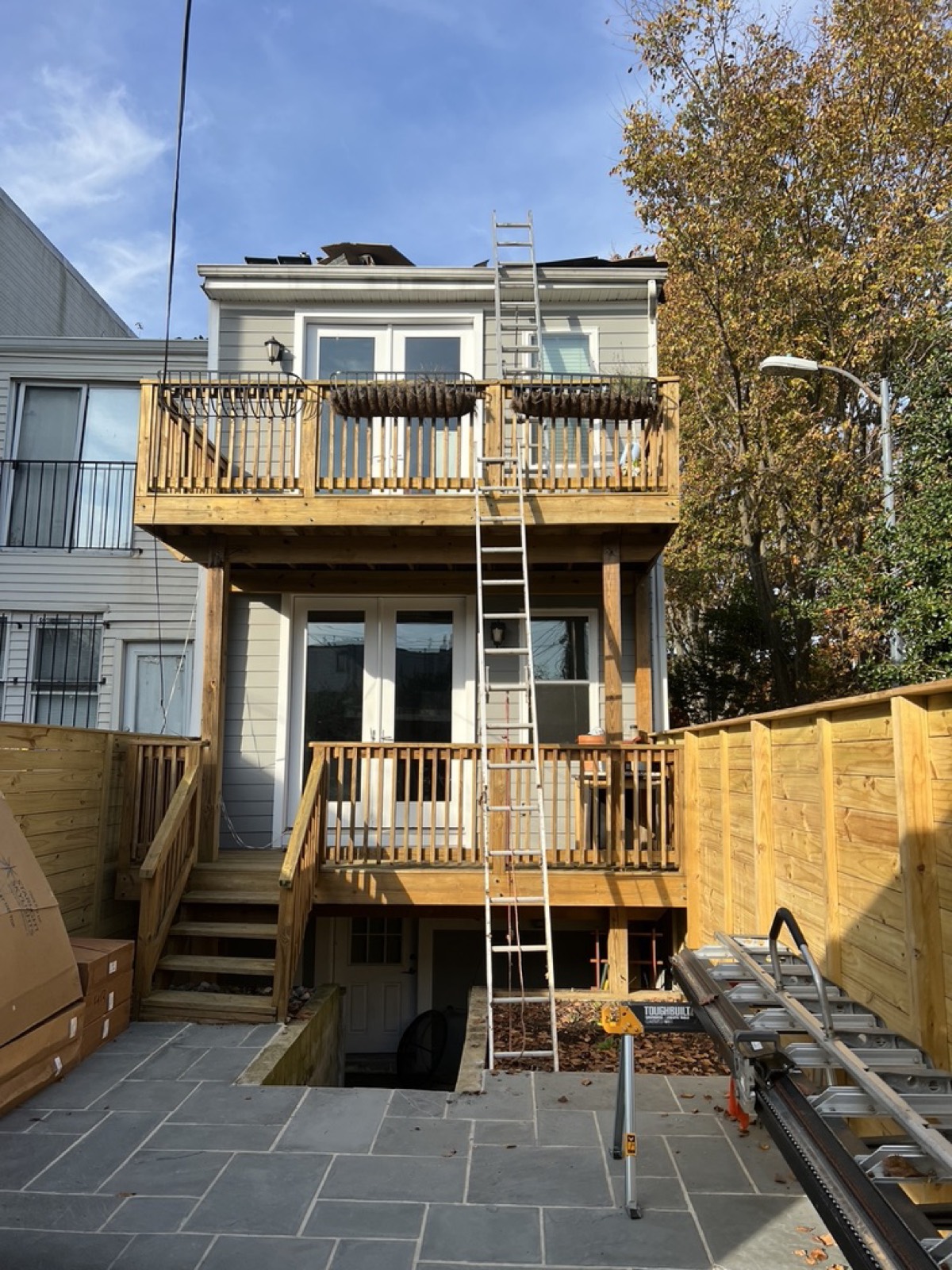 Two story deck fence bluestone