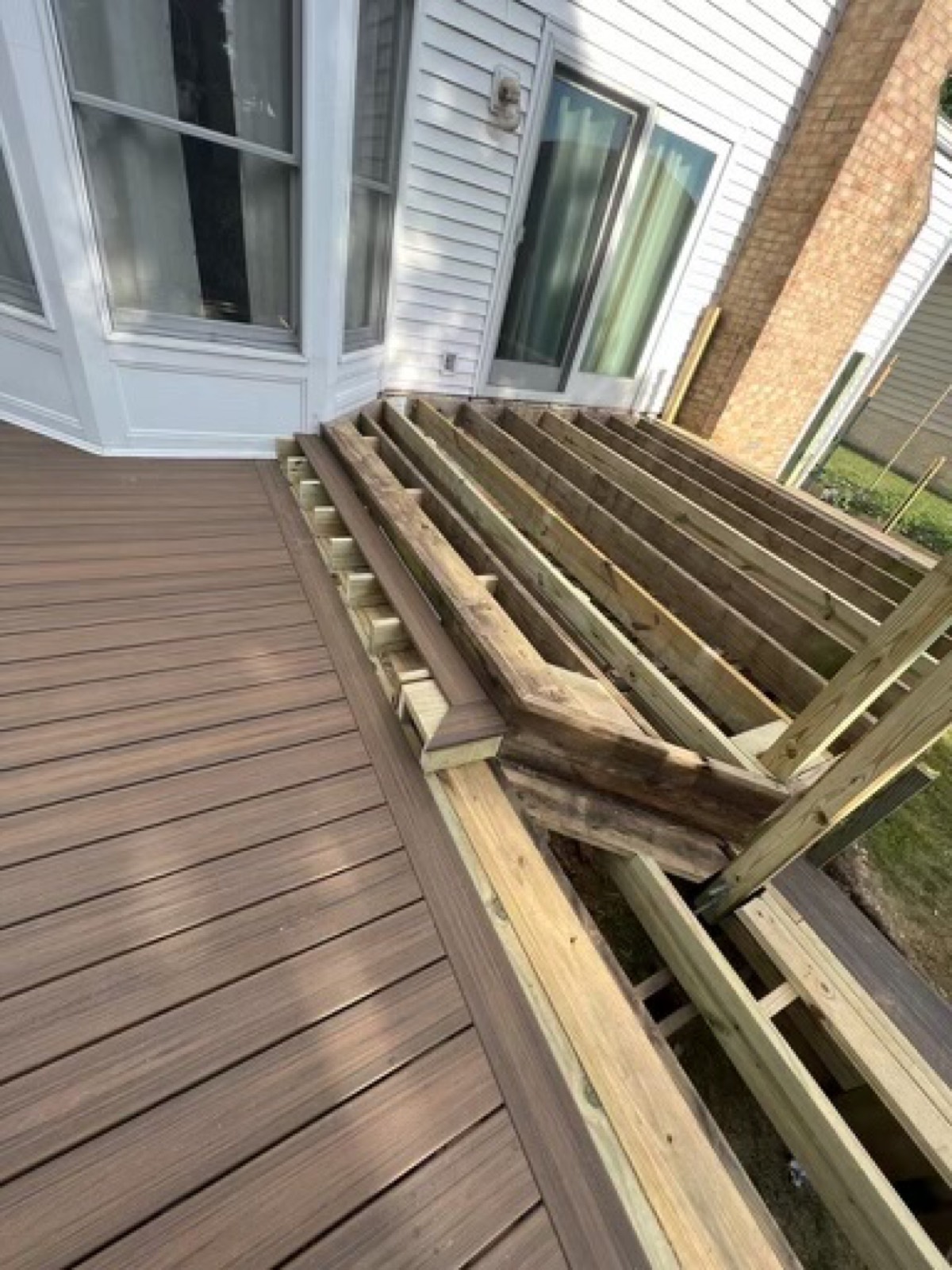 Weathered deck stairs before