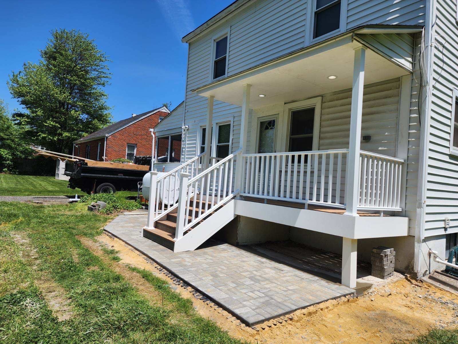 White porch paver patio